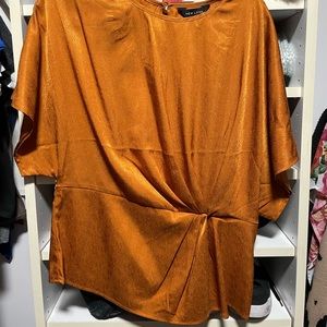 Orange dressy shirt.